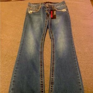 Nice pair of Premier bootcut Jeans..Never worn brand new. Midrise bootcut jeans.
